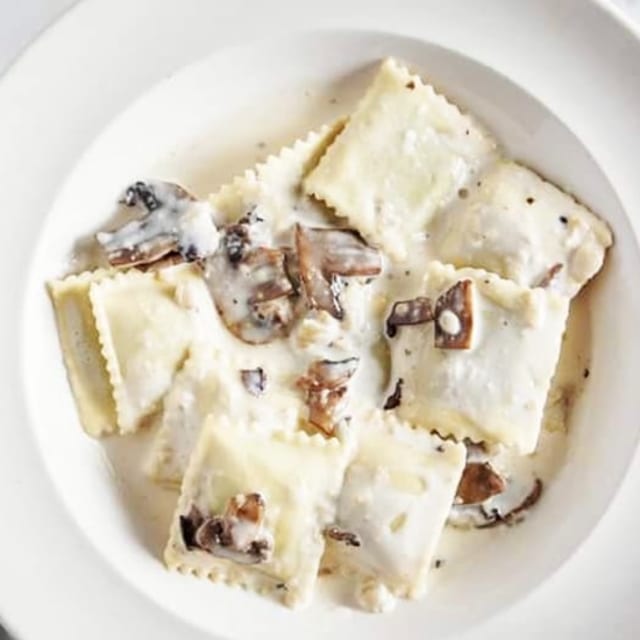 Chicken & Spinach Ravioli in Mushroom Cream Sauce.